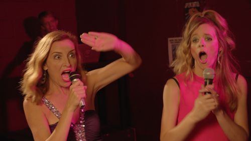 Robyn Paris and Heather Turman in The Room Actors: Where Are They Now? (2016)
