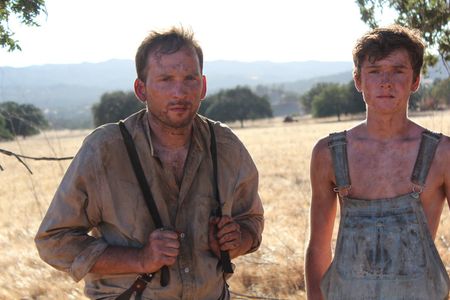 Still from Dirt Eaters featuring Justin Hall and Ron Hanks