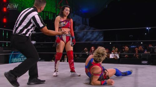 Paul Turner, Hikaru Shida, and Ryo Mizunami in All Elite Wrestling: Revolution (2021)