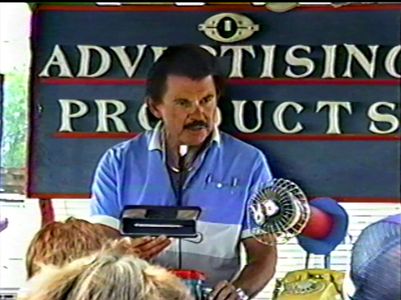 A man advertising the new and unusual Magic Writer Pen at Collinsville Trade Day.