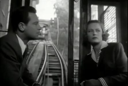 William Holden and Alexis Smith in The Turning Point (1952)