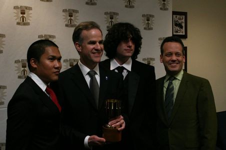 Dante Basco (l),Jack De Sena (3rd from l),Dee Bradley Baker (r) present Harley Jessup with the award for feature produ