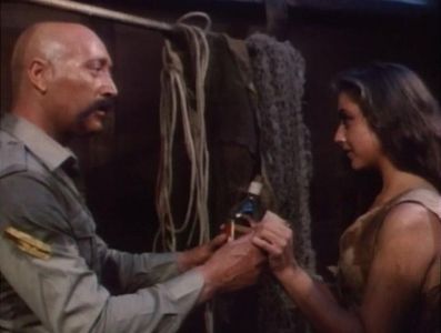 Cristina Lay and Serafino Profumo in Escape from Hell (1980)