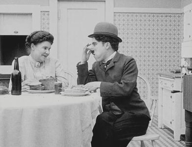 Charles Chaplin and Eva Thatcher in The Count (1916)
