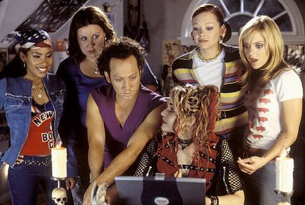 After waking up in the body of a 30-year-old man, Jessica (Rob Schneider, center left) and friends Keecia (Maritza Murra