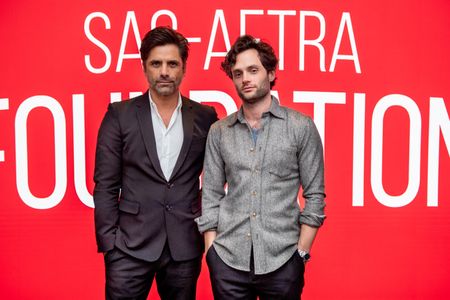 John Stamos and Penn Badgley at an event for You (2018)