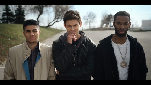Owen Roth, Mena Massoud, and Ayinde Blake in Masters in Crime.