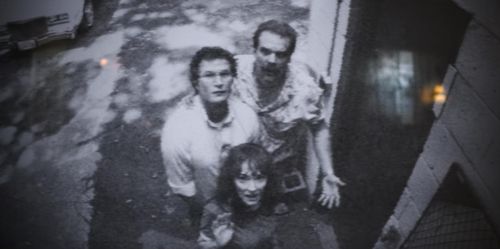 Winona Ryder, David Harbour, and Alec Utgoff in Stranger Things (2016)