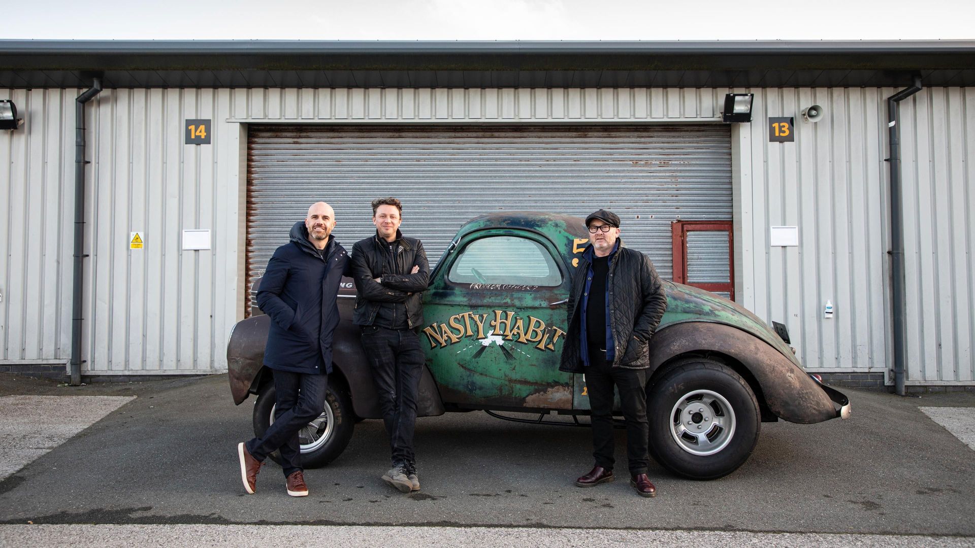 Three Men Four Wheels background