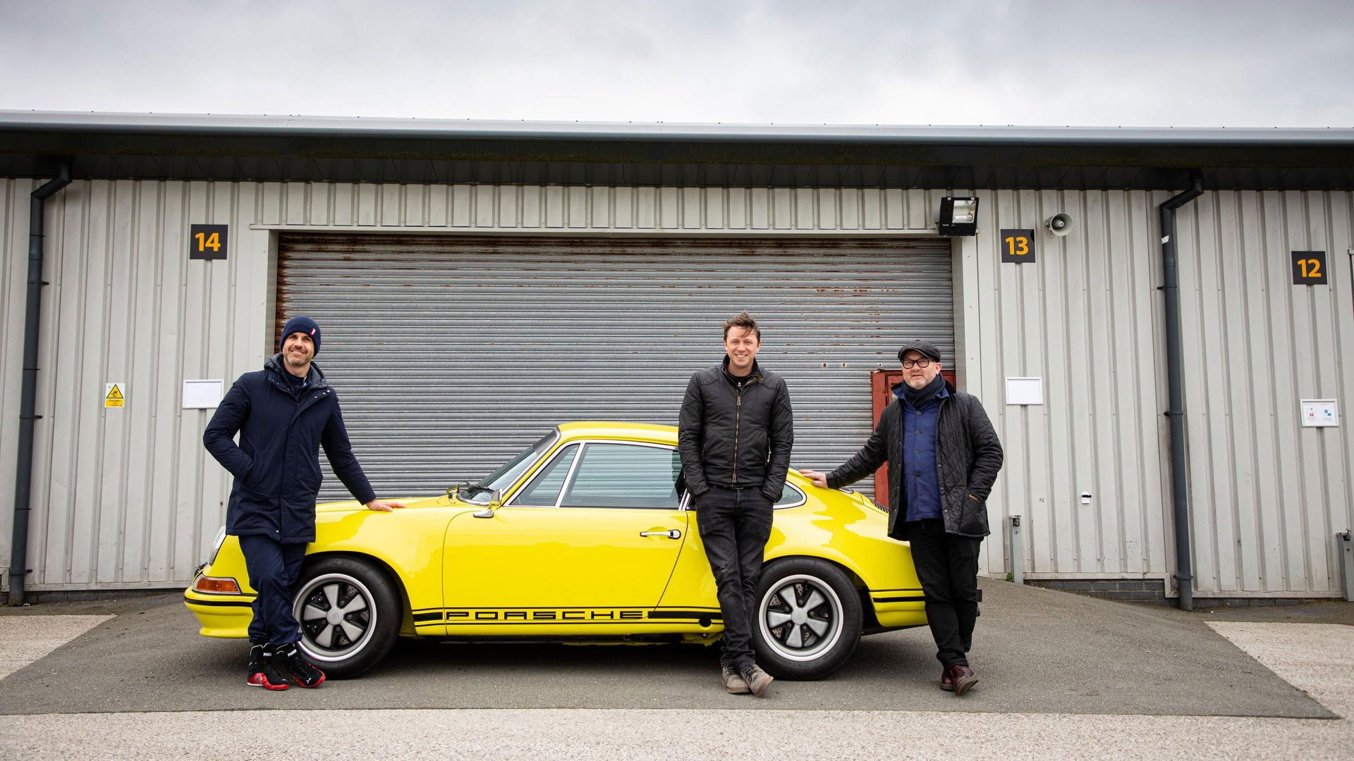 Three Men Four Wheels background