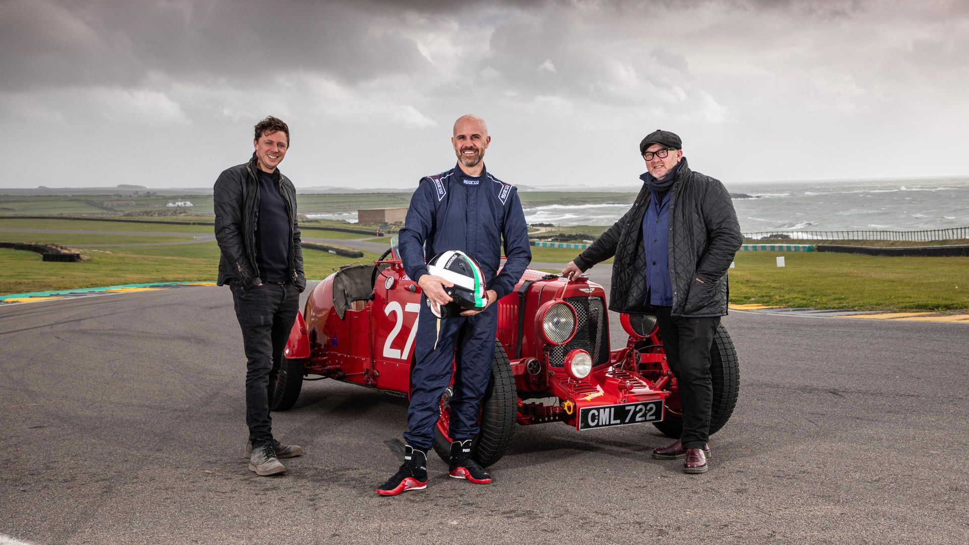 Three Men Four Wheels background