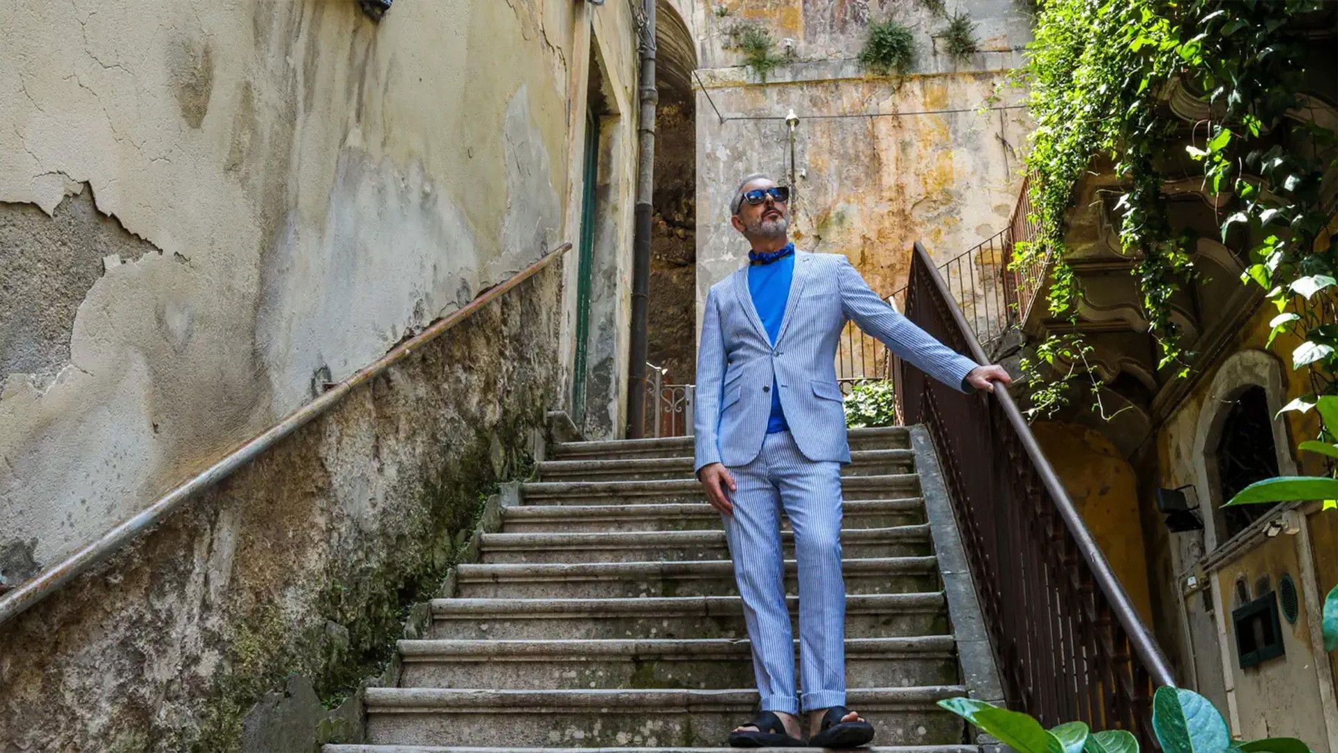 Alan Cumming's Paradise Homes background