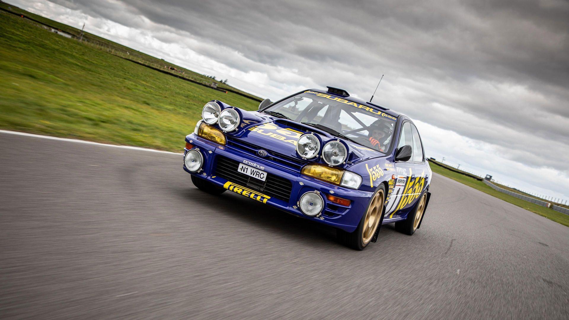 Three Men Four Wheels background