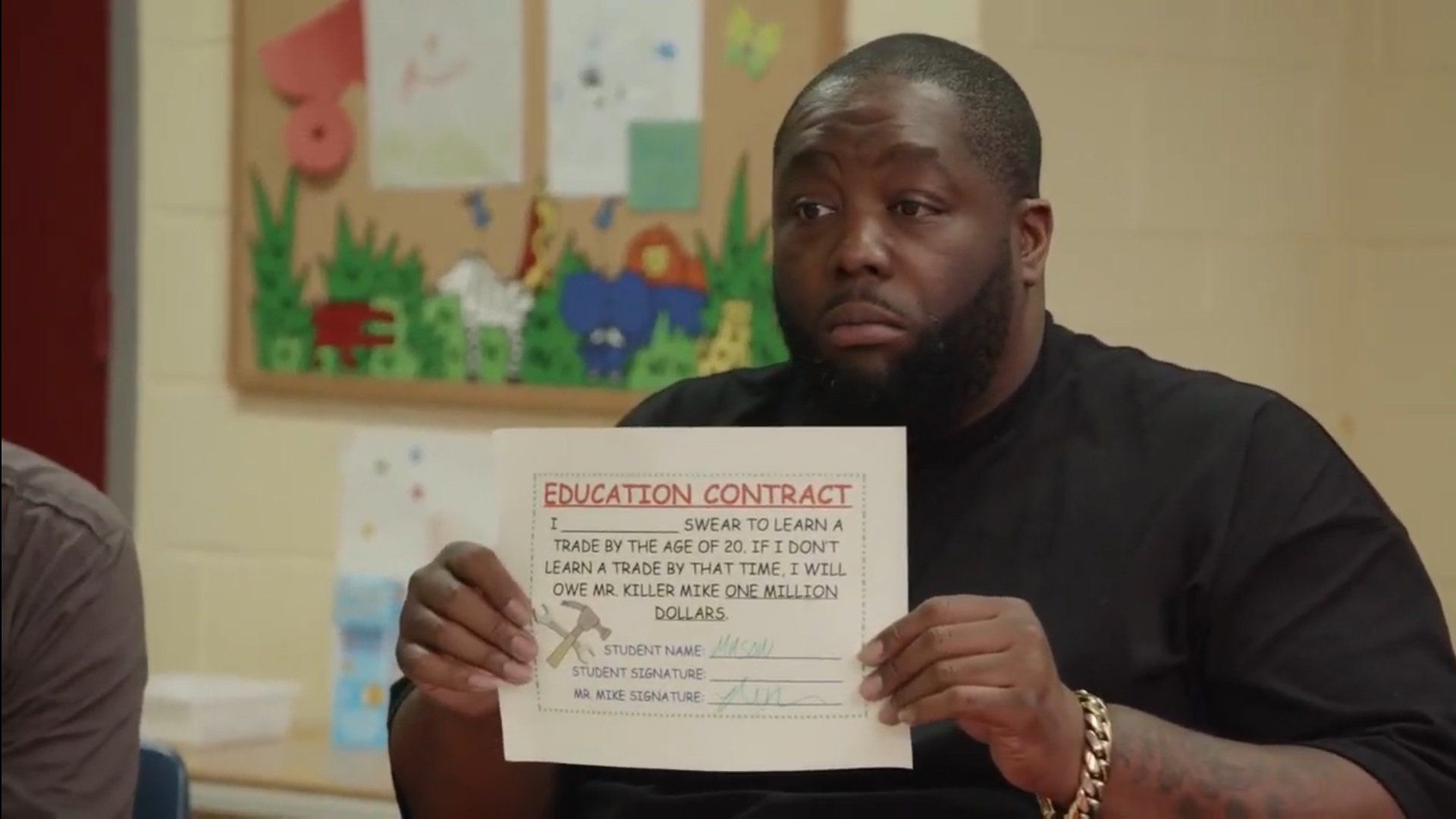 Trigger Warning with Killer Mike background