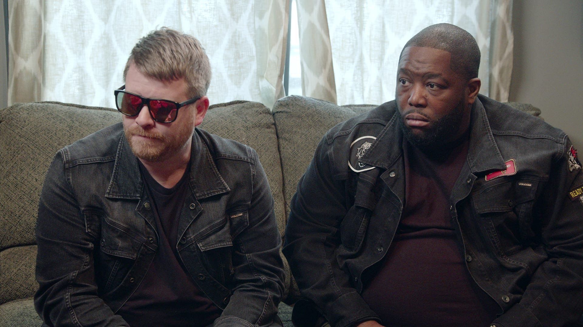 Trigger Warning with Killer Mike background