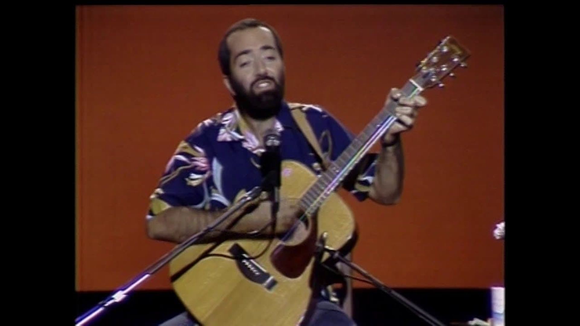 A Young Children's Concert with Raffi background
