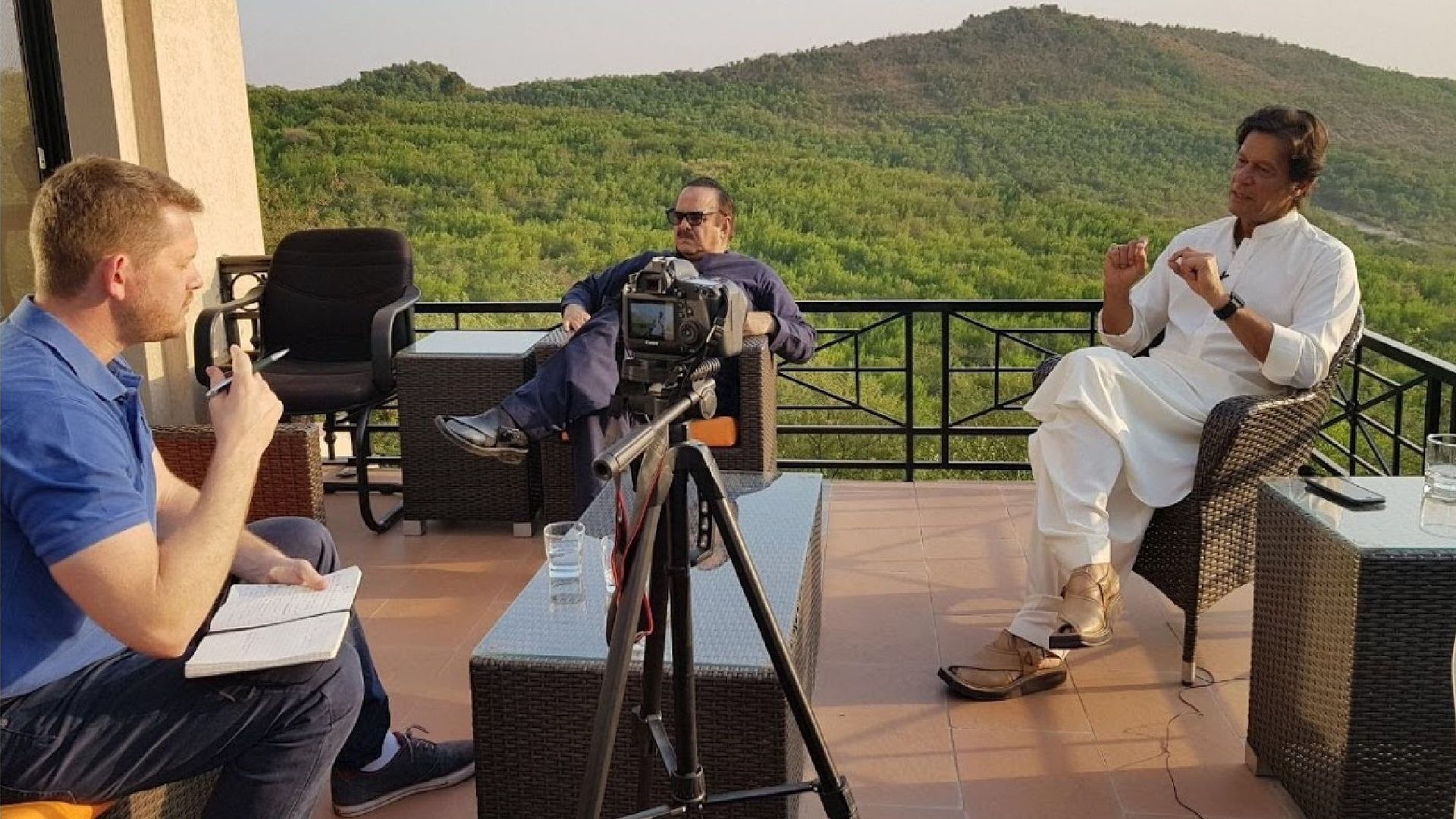 Dennis Does Pakistan background