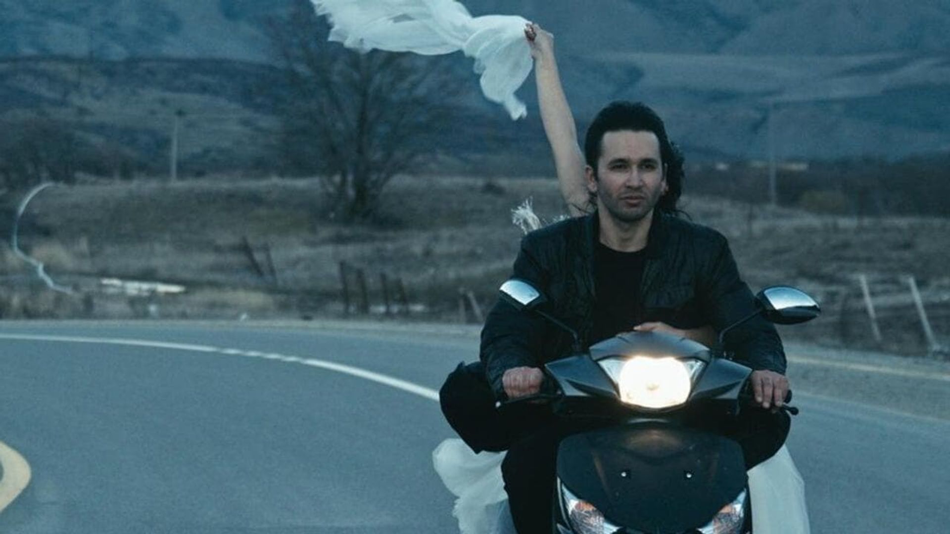 In Between Dying background