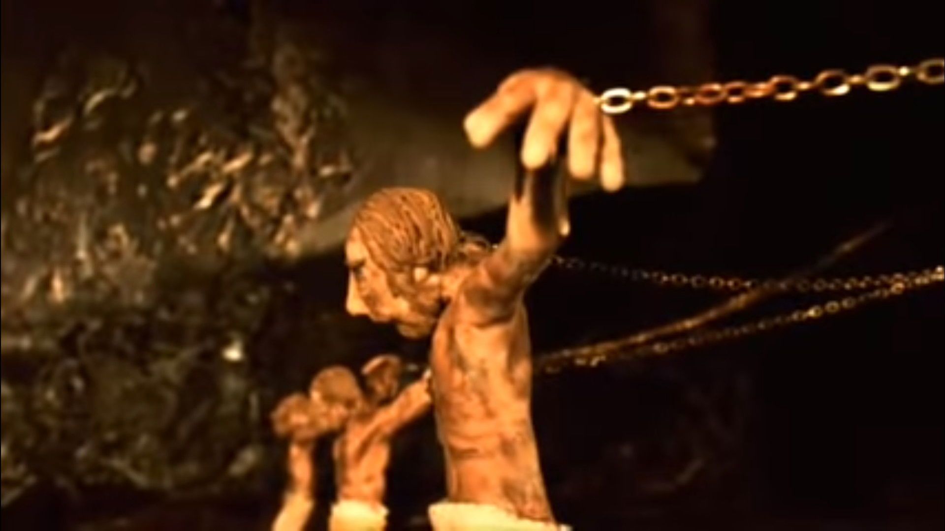 The Cave: An Adaptation of Plato's Allegory in Clay background