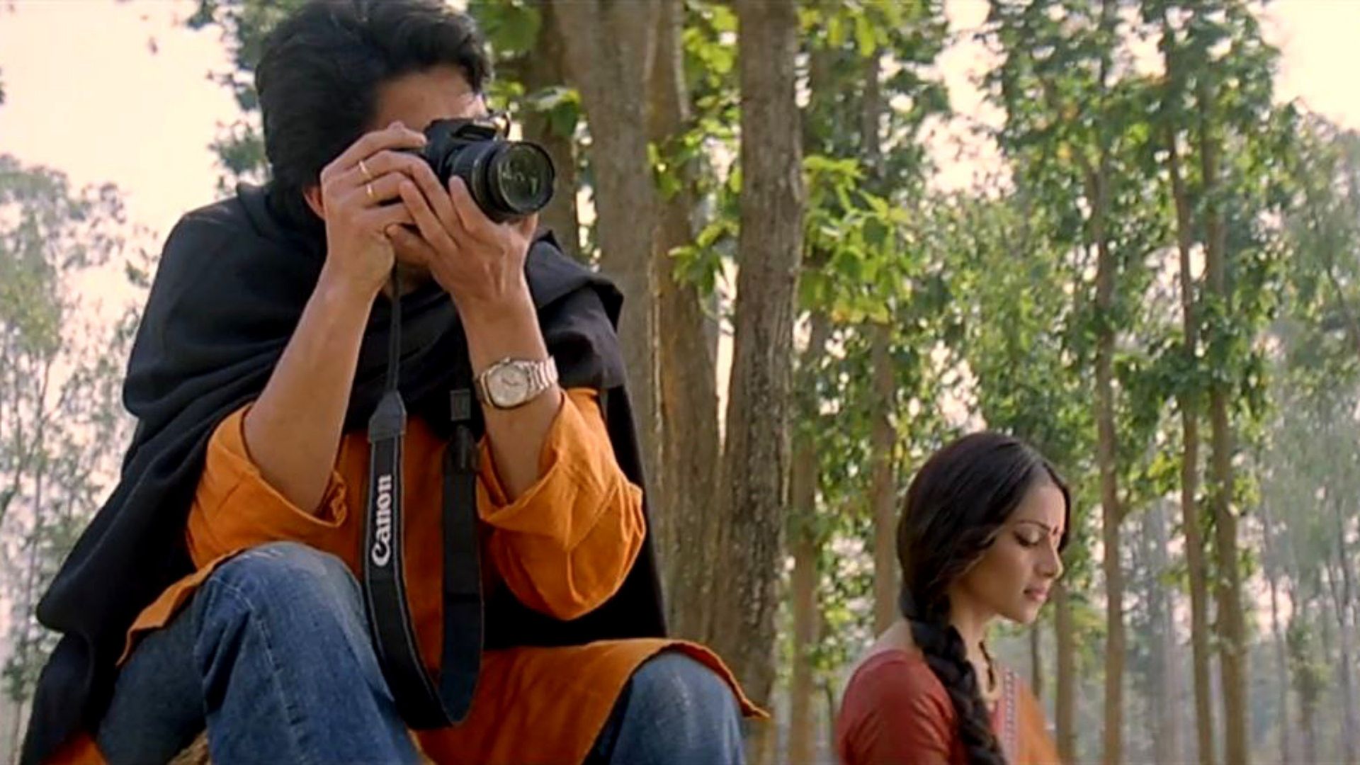 Shob Charitro Kalponik background