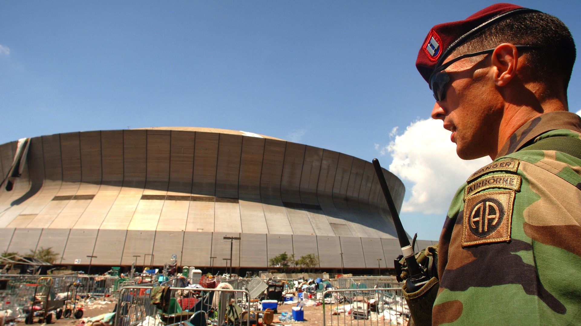 Katrina Cop in the Superdome background