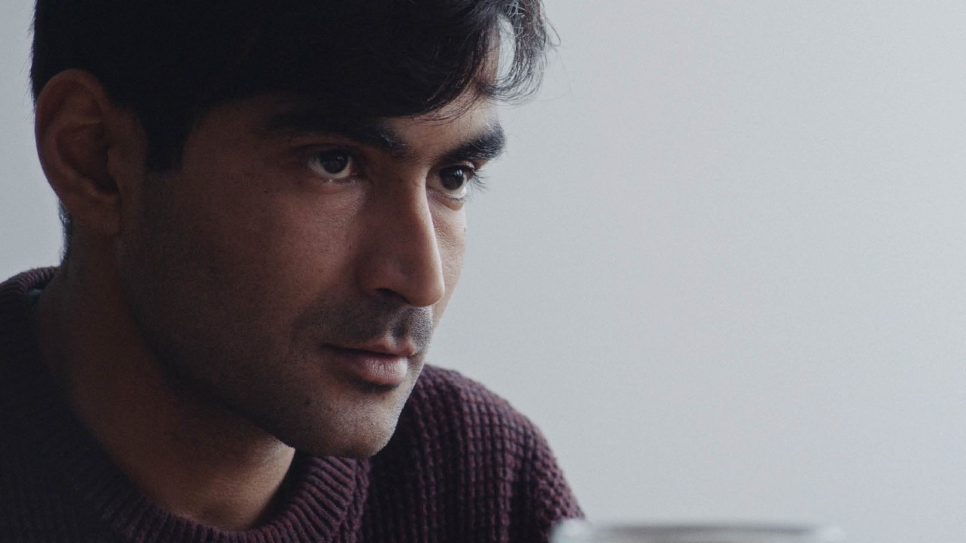 Die Anhörung background