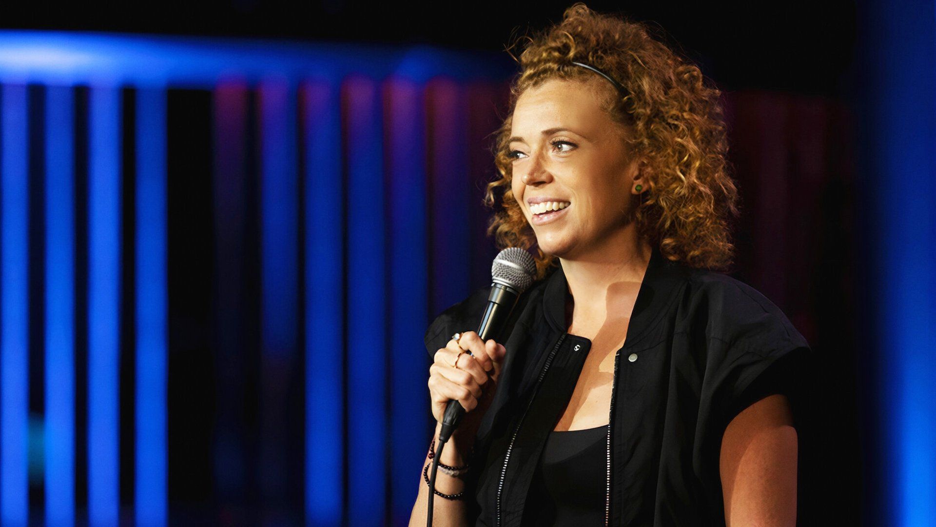 Michelle Wolf: The Well background