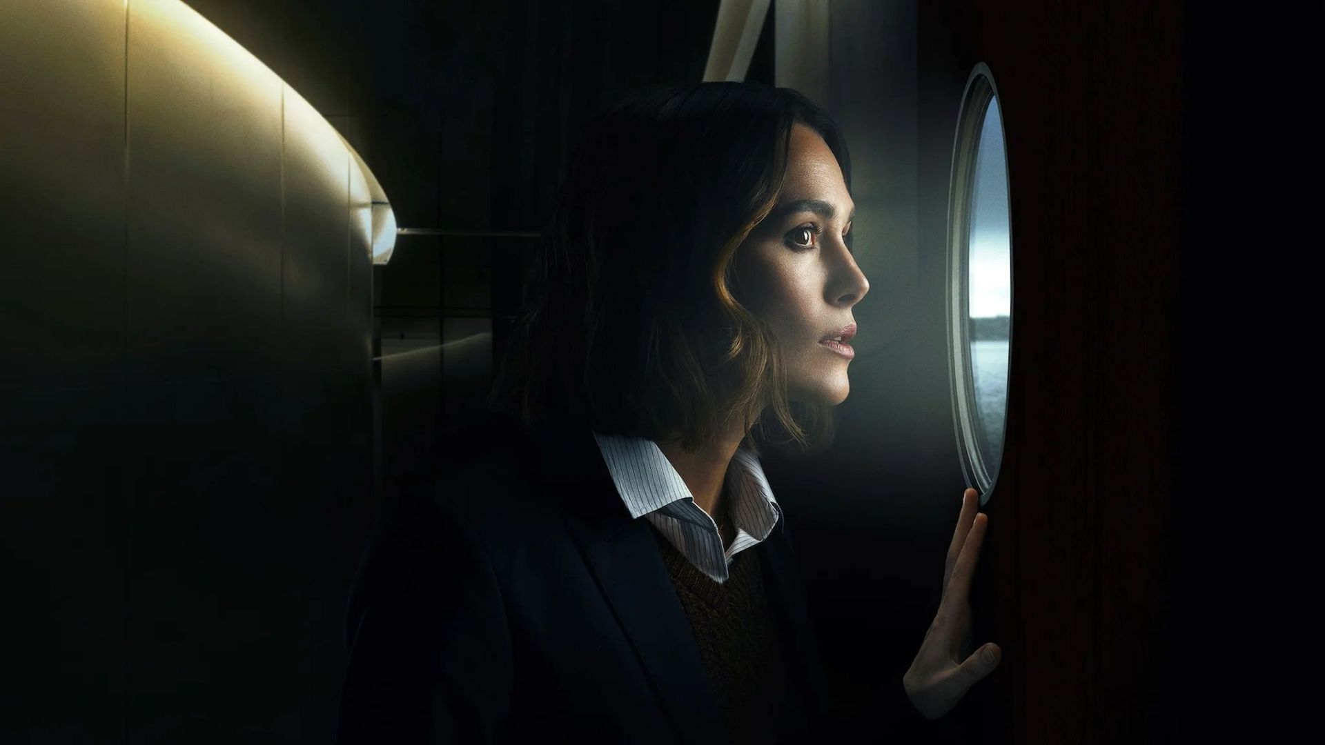 The Woman in Cabin 10 background
