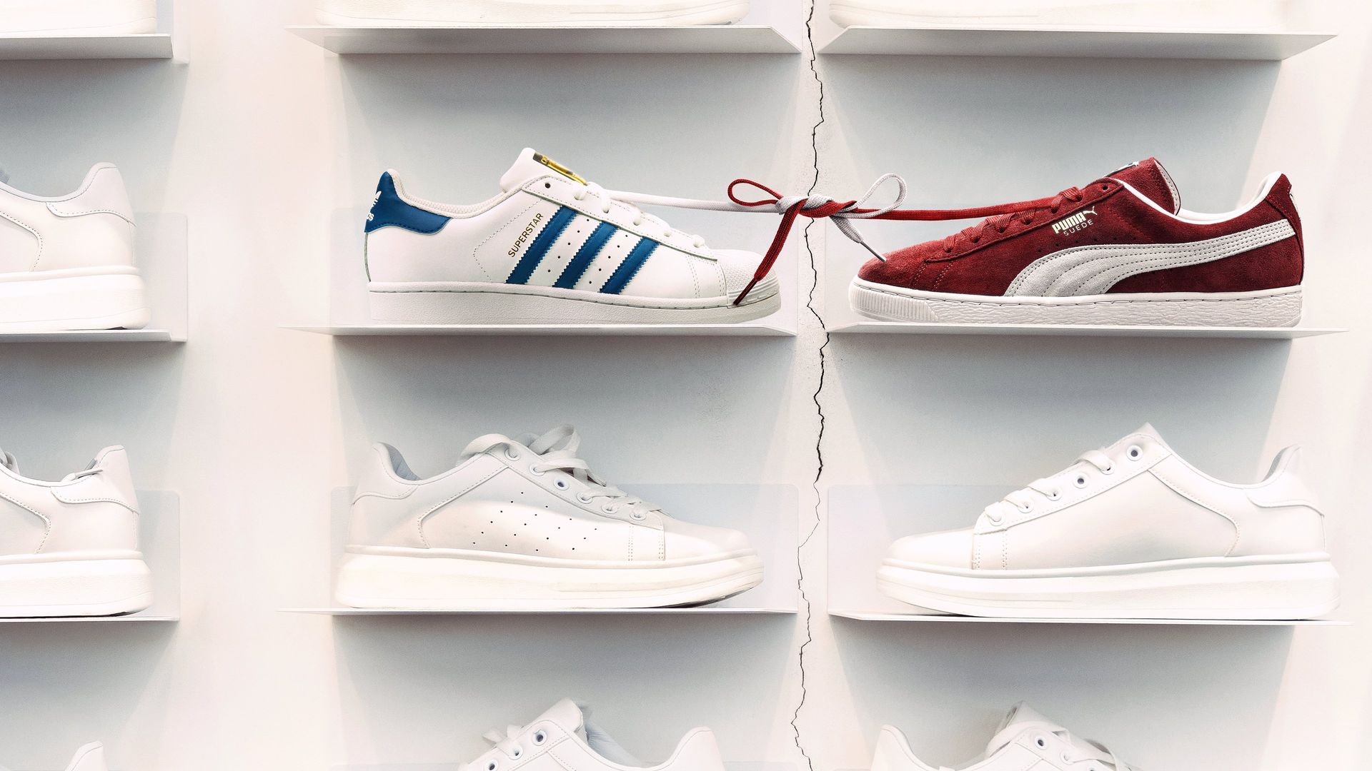 Sneaker Wars: Adidas v Puma background