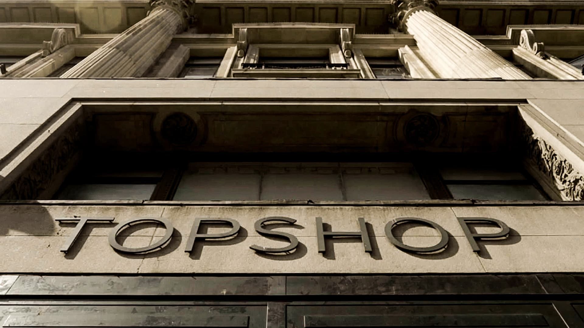 Trouble at Topshop background