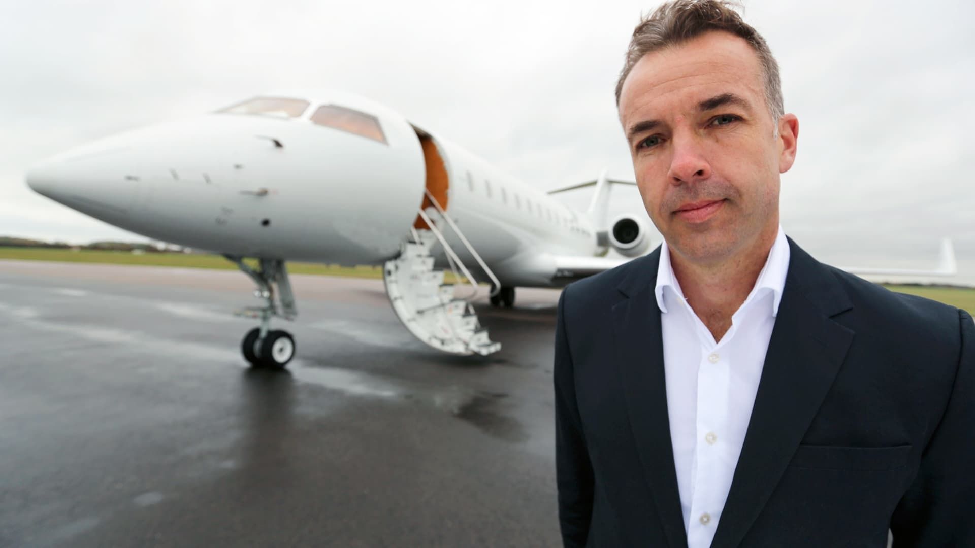 The Super-Rich and Us background